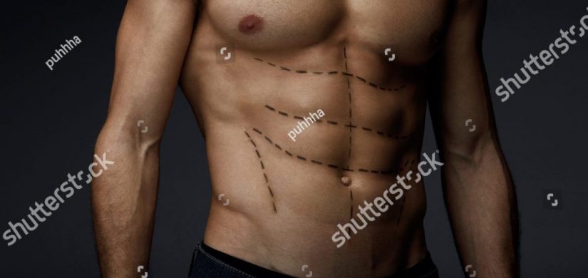 stock-photo-man-sexy-body-with-black-lines-on-skin-closeup-of-beautiful-fit-muscular-male-torso-with-pencil-595101287