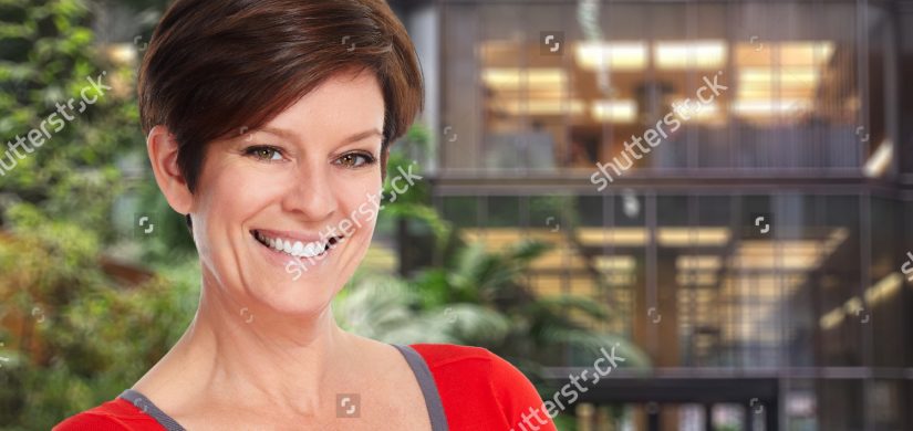 beautiful-mature-smiling-lady-over-office-324631448 beautiful-mature-smiling-lady-over-office-324631448
