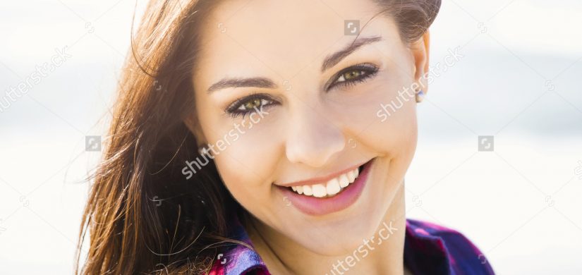 portrtait-happy-girl-beach-smilling-290465765