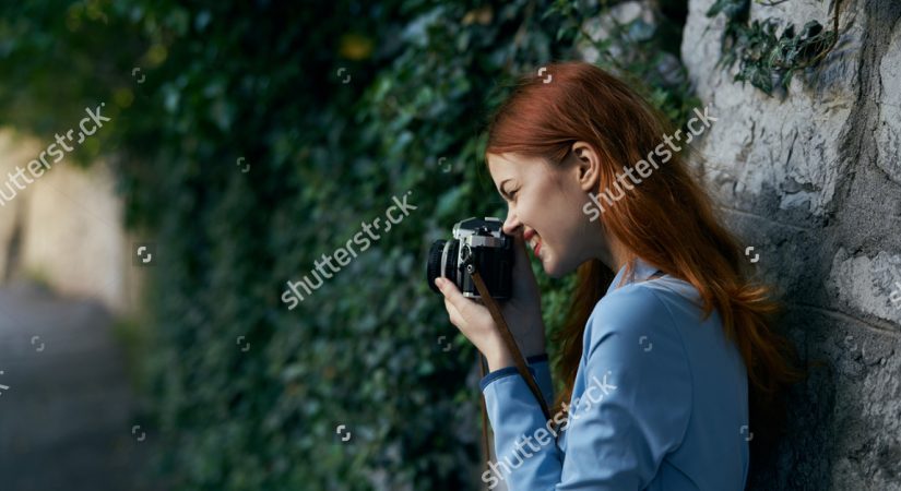 woman-taking-pictures-669978748